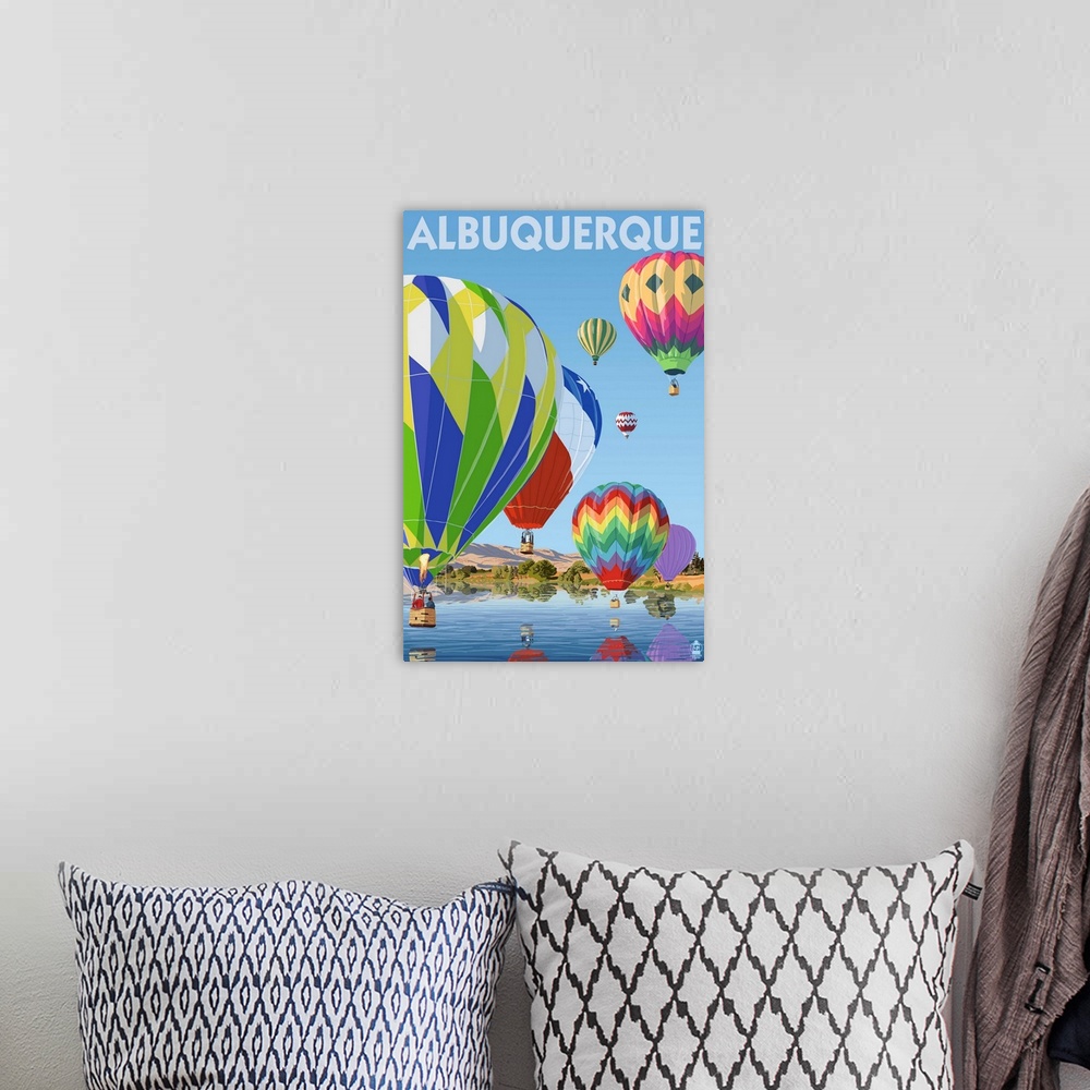 A bohemian room featuring Retro stylized art poster of hot air balloons flying over a lake casting reflections.