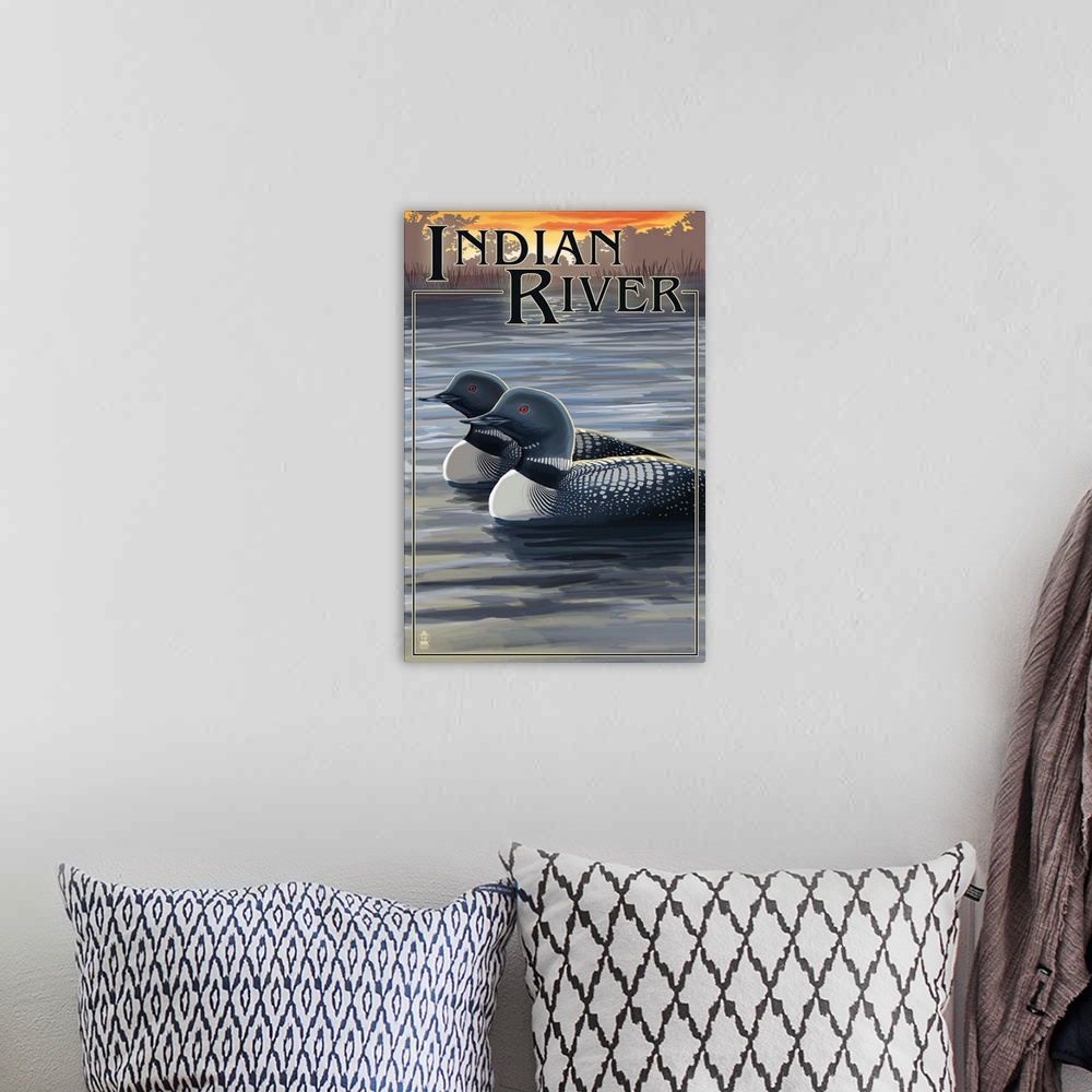A bohemian room featuring Retro stylized art poster of two loons on a lake at sunset.
