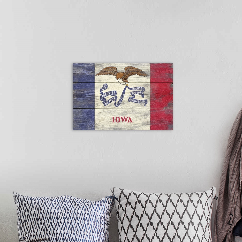 A bohemian room featuring The flag of Iowa with a weathered wooden board effect.