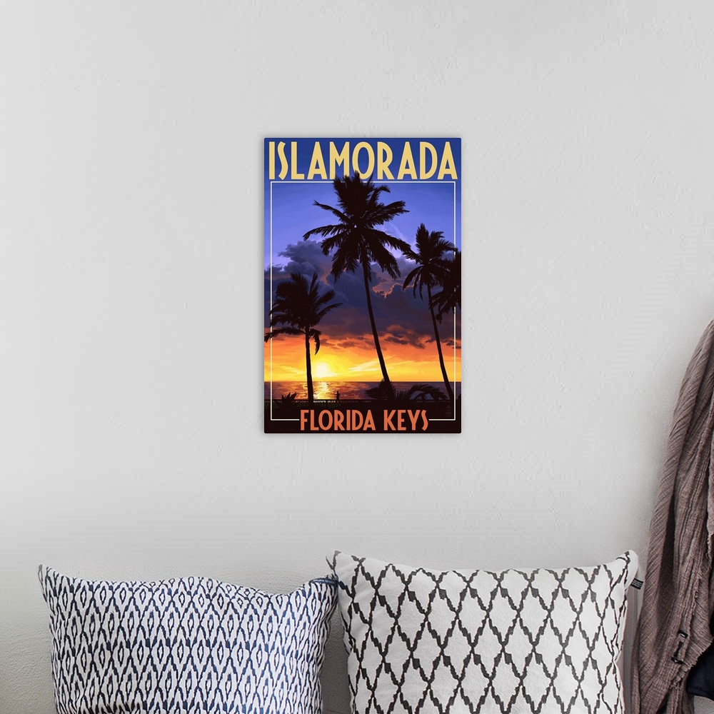 A bohemian room featuring A retro stylized art poster of three silhouetted palm trees on a beach at a sunset that illuminat...