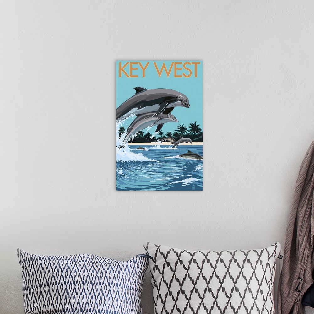 A bohemian room featuring Key West, Florida - Dolphins Swimming: Retro Travel Poster