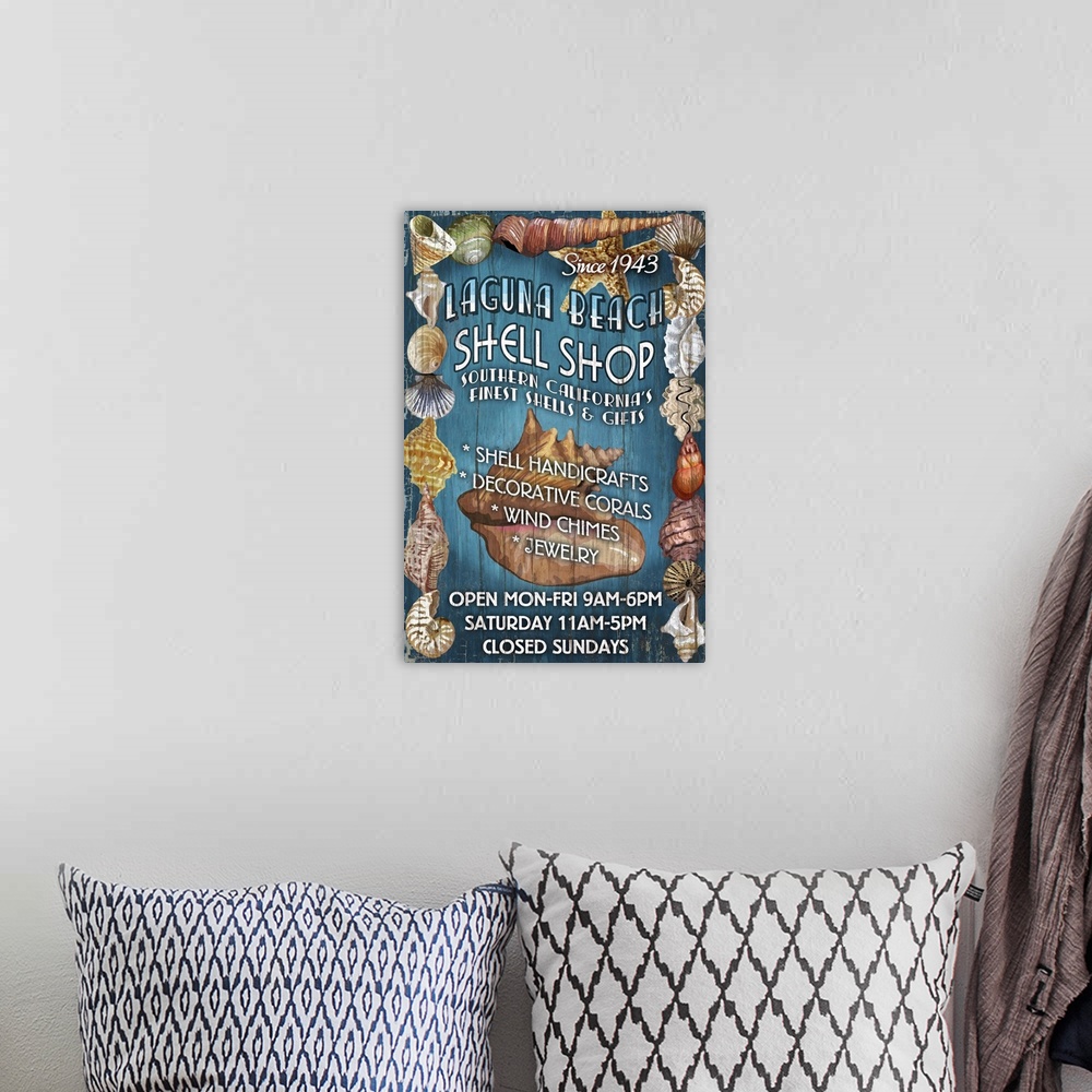 A bohemian room featuring Laguna Beach, California - Shell Shop Vintage Sign: Retro Travel Poster