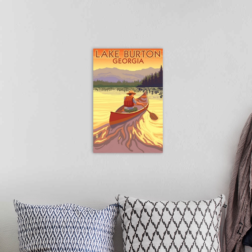 A bohemian room featuring Retro stylized art poster of a man in a canoe paddling toward a line of trees at sunset.