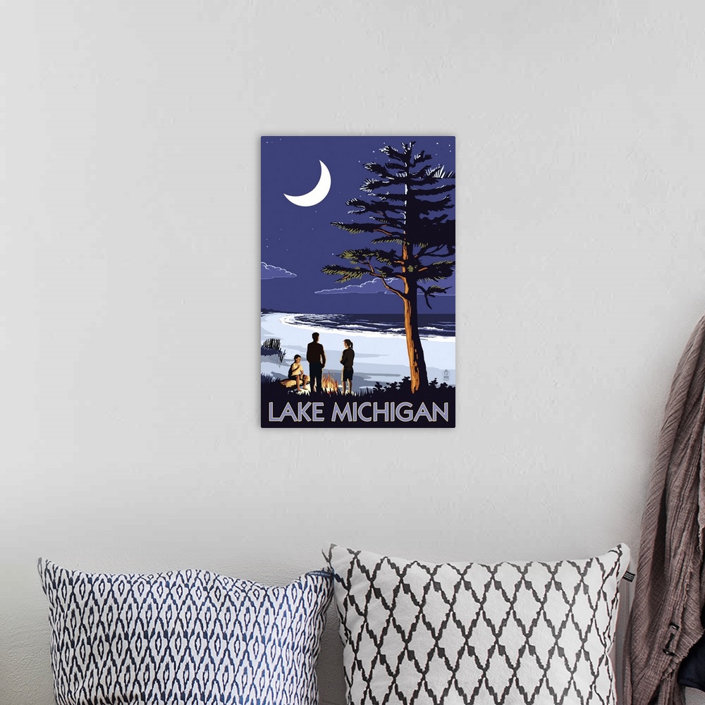 A bohemian room featuring Retro stylized art poster of people on a beach at night, with large crescent moon in the sky.
