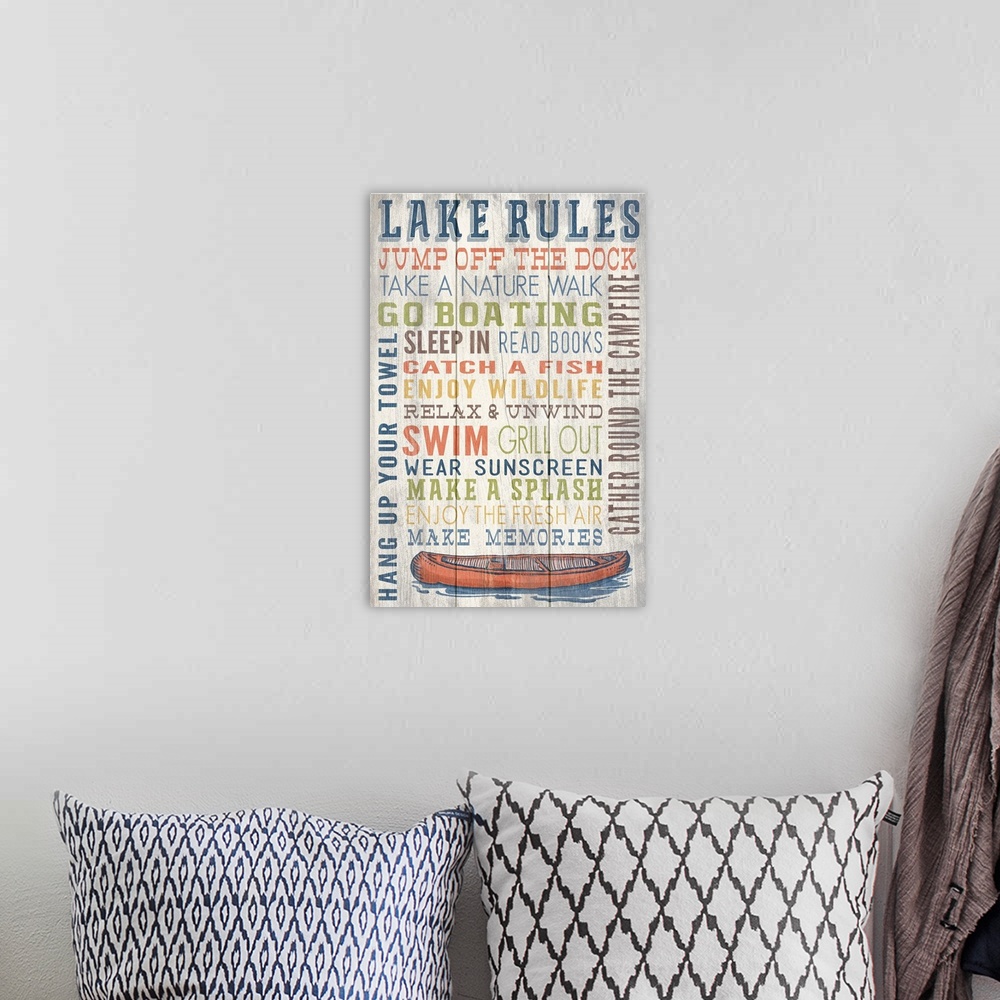 A bohemian room featuring Lake Rules Typography
