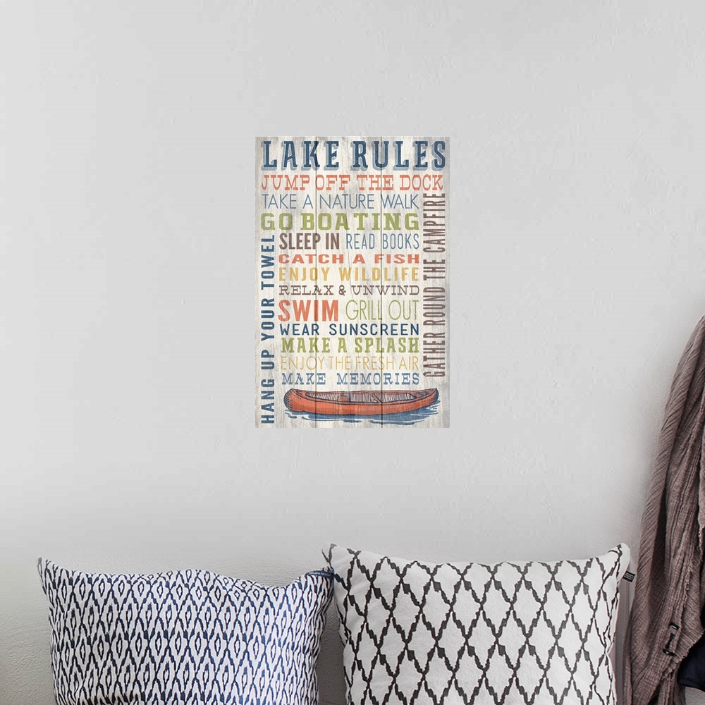 A bohemian room featuring Lake Rules Typography