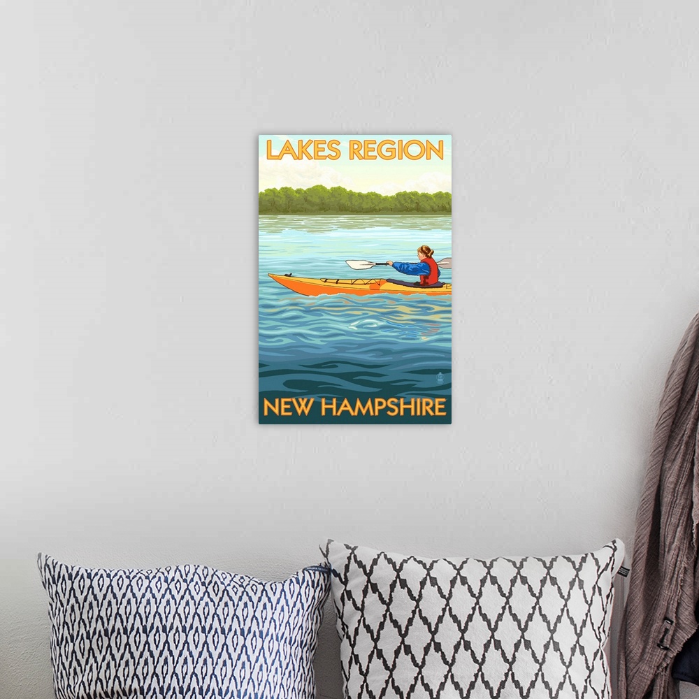 A bohemian room featuring Retro stylized art poster of a woman in a kayak on a clear blue lake.