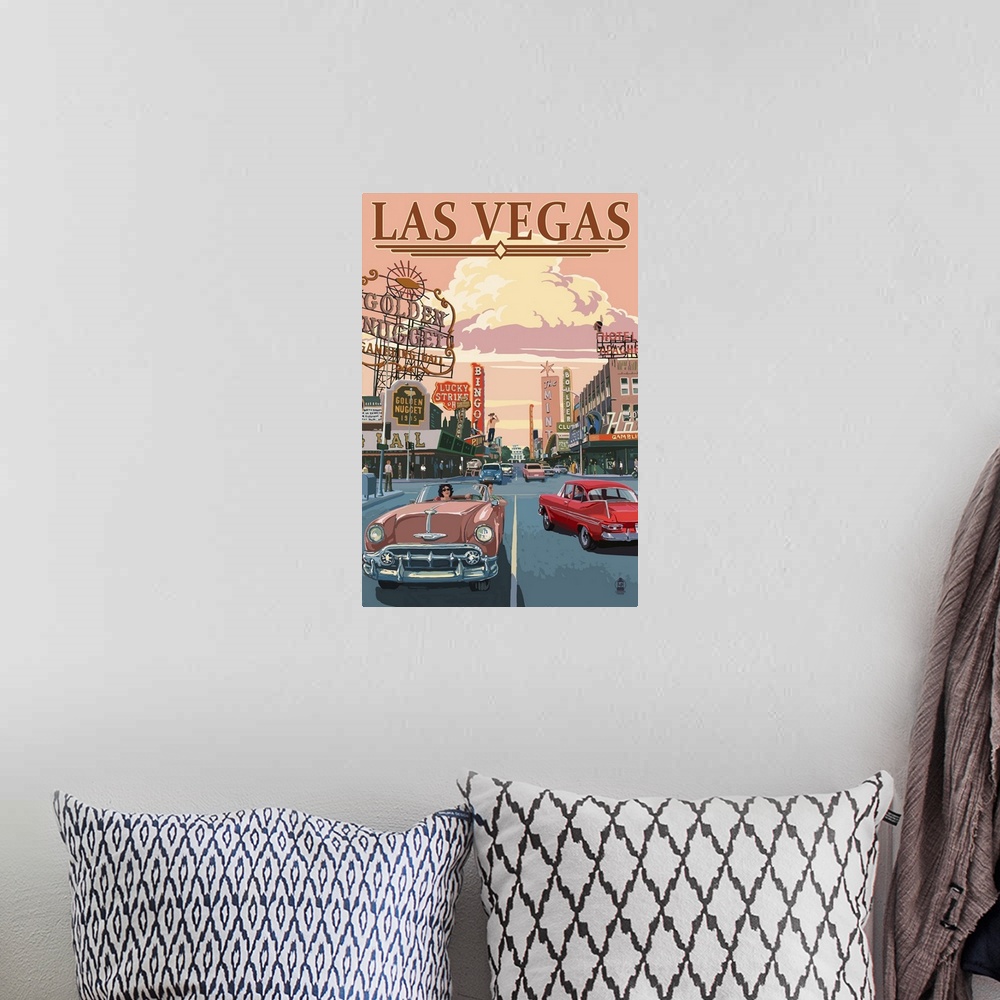 A bohemian room featuring Retro stylized art poster of a city scene, with cars driving down the road alongside of casinos.
