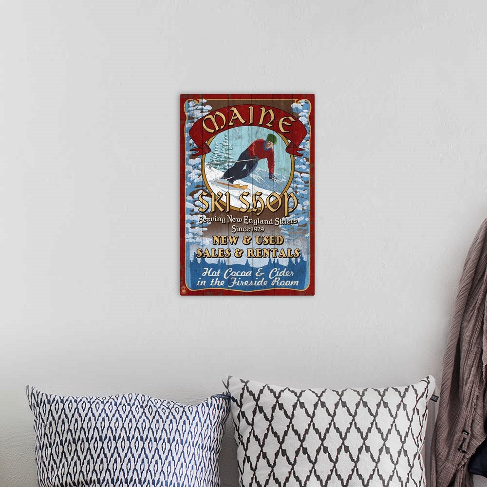 A bohemian room featuring Retro stylized art poster of a vintage sign of a skier going down a hill.