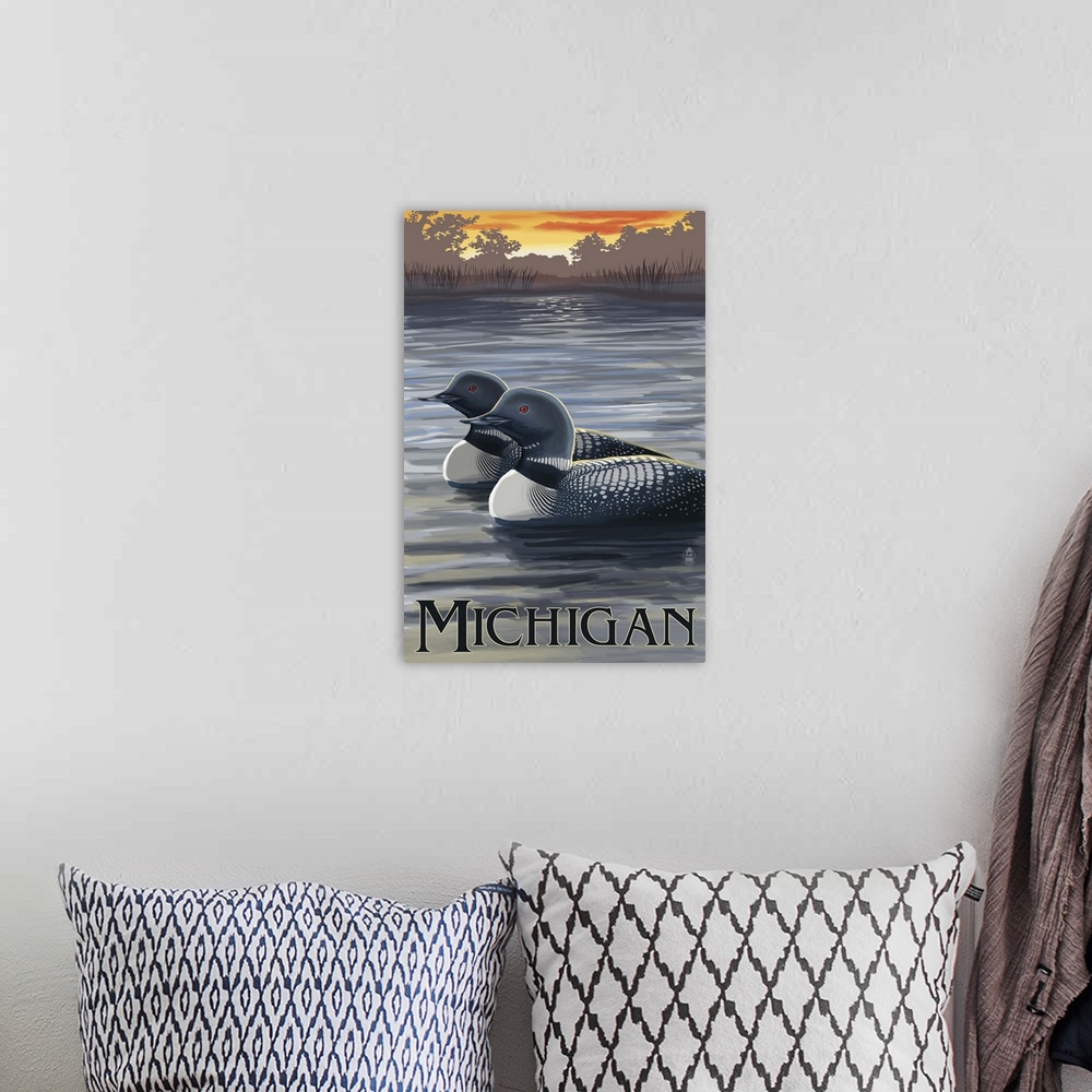 A bohemian room featuring Retro stylized art poster of tow loons on a lake at sunset.