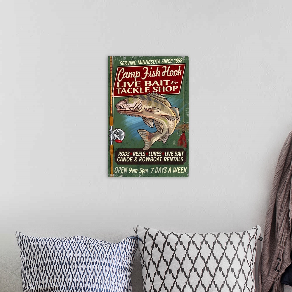 A bohemian room featuring Retro stylized art poster of a vintage sign with an image of a fish and tackle gear.