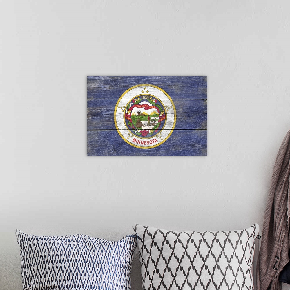 A bohemian room featuring The flag of Minnesota with a weathered wooden board effect.