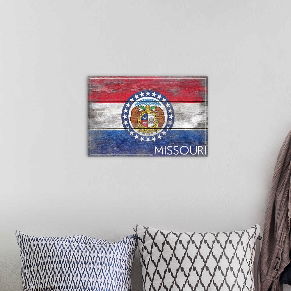 A bohemian room featuring The flag of Missouri with a weathered wooden board effect.