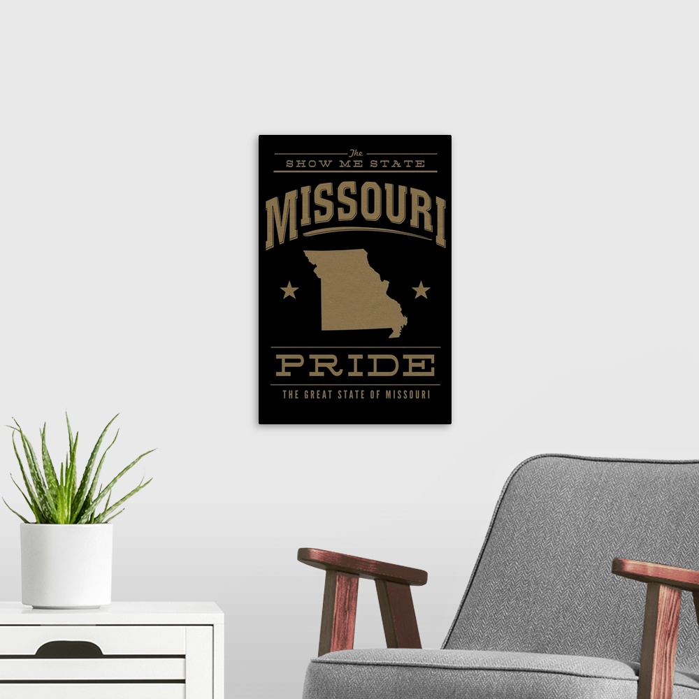 A modern room featuring The Missouri state outline on black with gold text.