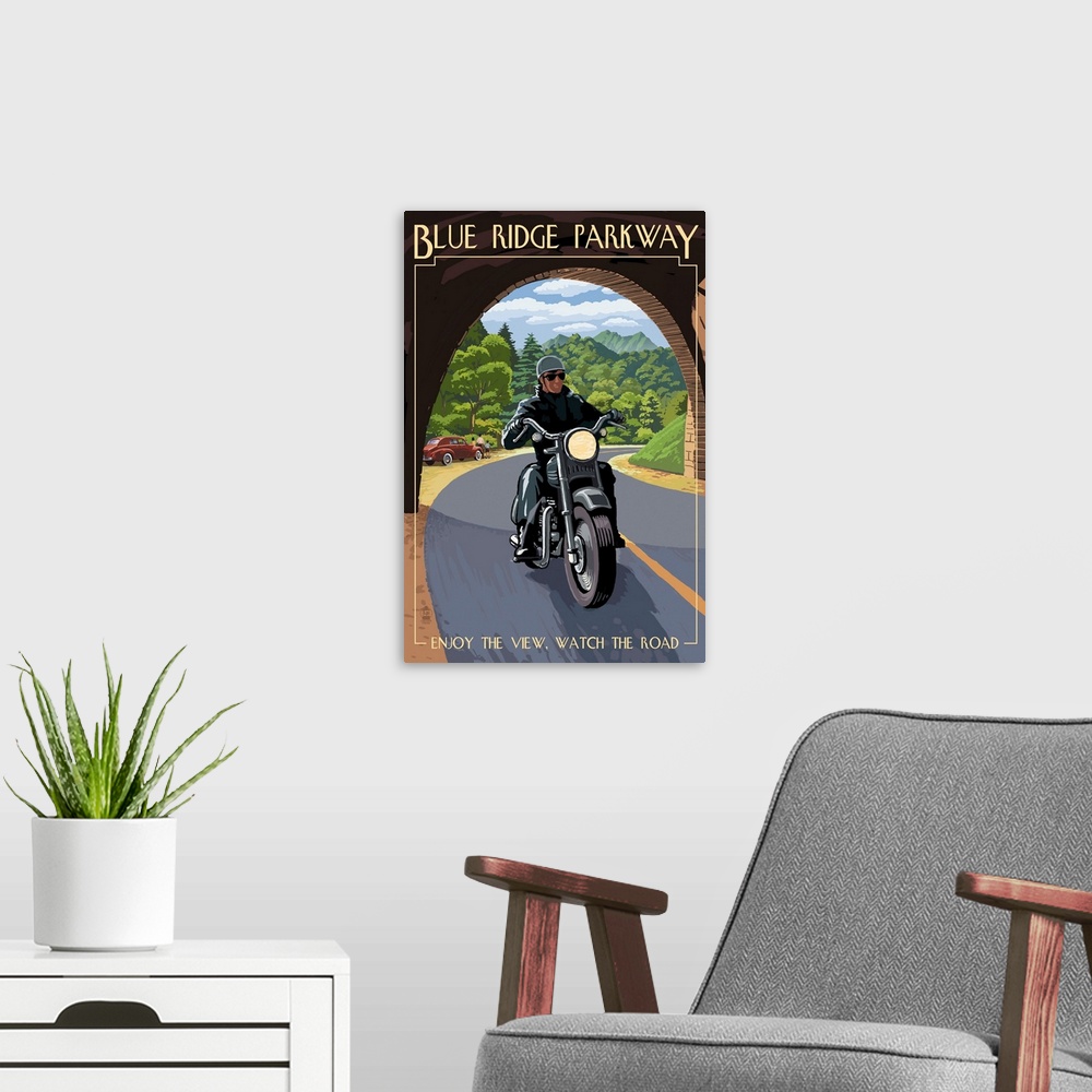 A modern room featuring Retro stylized art poster of motorcycle rider just crossing into a tunnel.