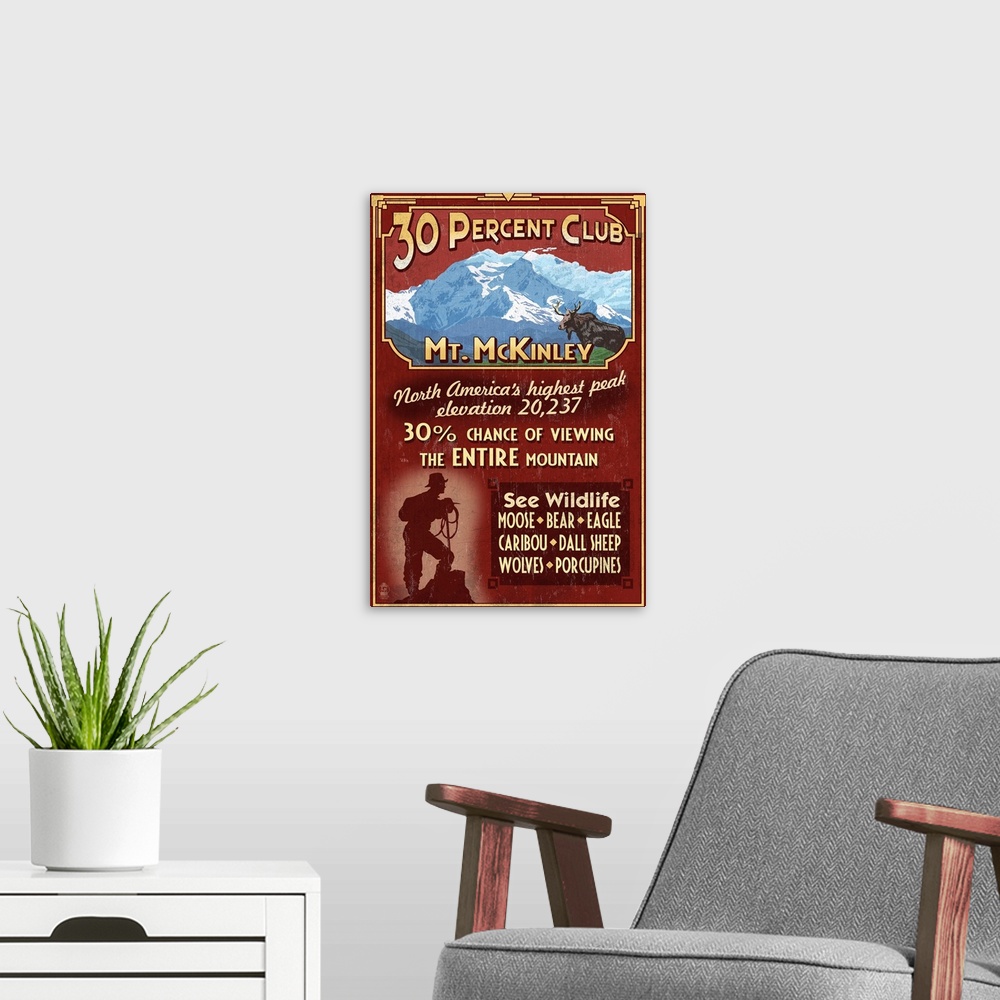 A modern room featuring Retro stylized art poster of a moose in the wild and the silhouette of a hiker at the bottom of t...