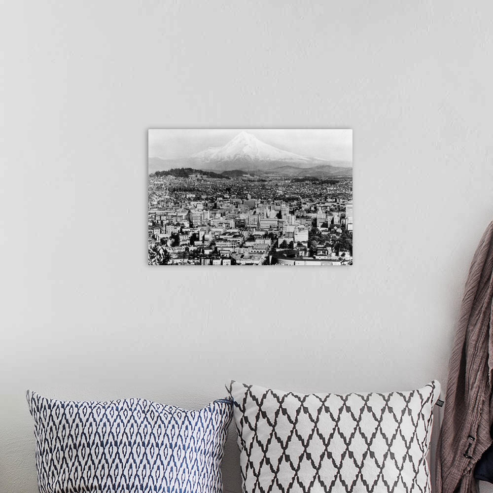 A bohemian room featuring Vintage photograph of the city of Portland, Oregon, with Mount Hood in the distance.