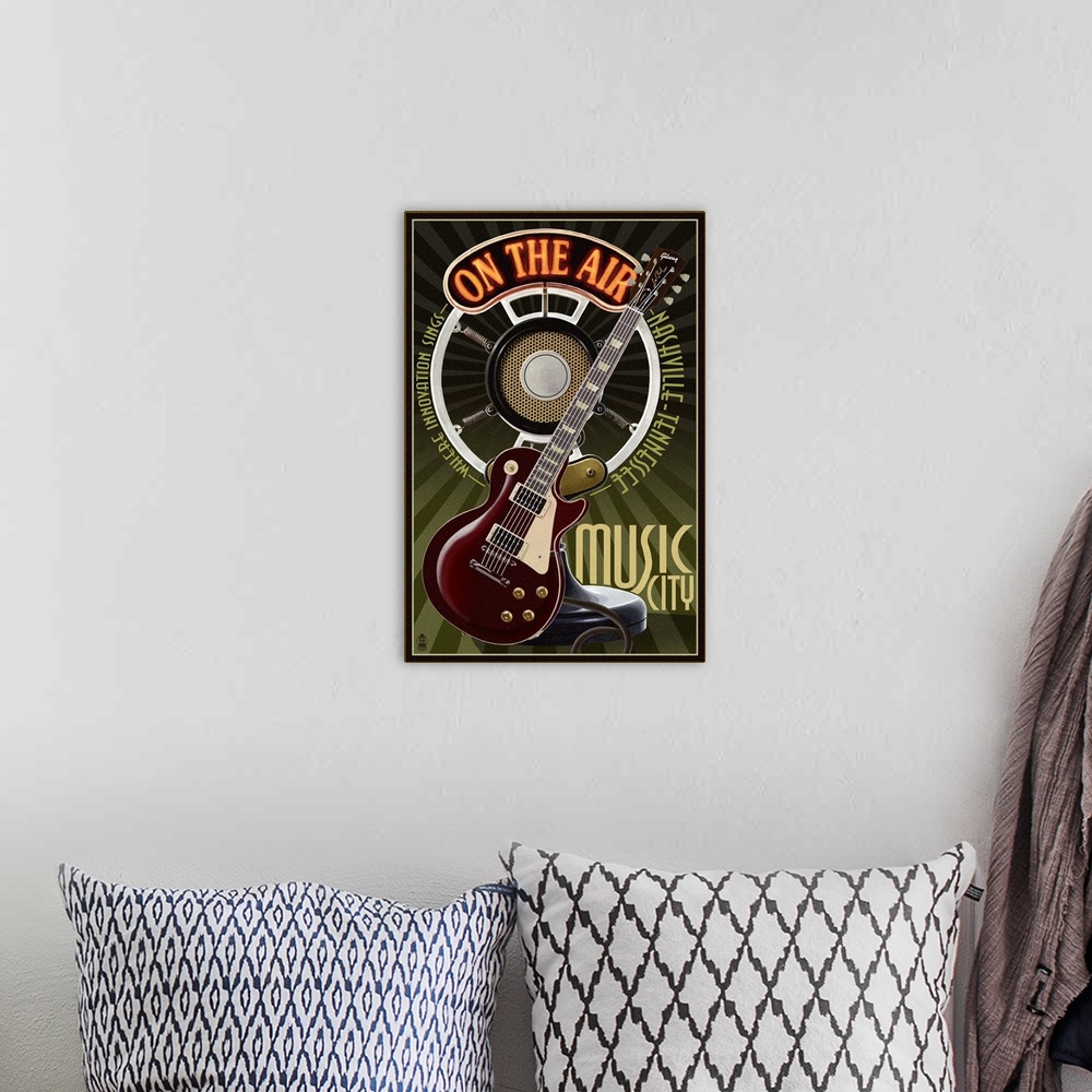 A bohemian room featuring Retro stylized art poster of an electric guitar with an old microphone in the background.