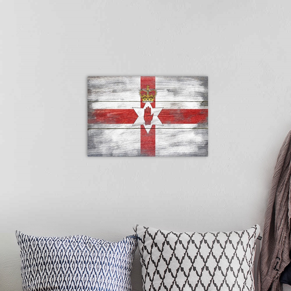 A bohemian room featuring The flag of Northern Ireland with a weathered wooden board effect.