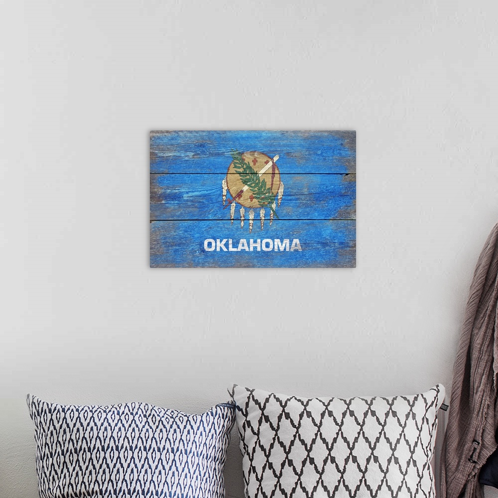 A bohemian room featuring Oklahoma State Flag, Barnwood Painting