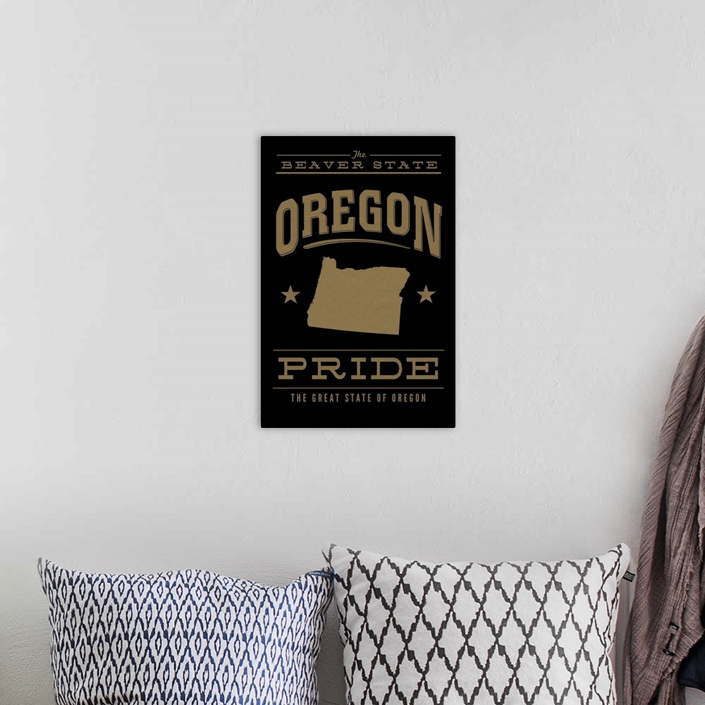 A bohemian room featuring The Oregon state outline on black with gold text.