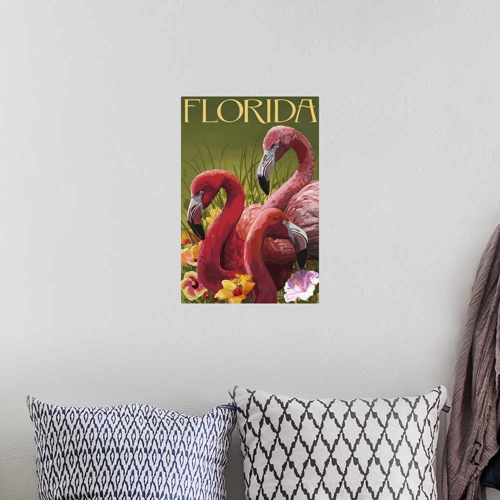 A bohemian room featuring Retro stylized art poster of flamingos surrounded by vibrant flowers.