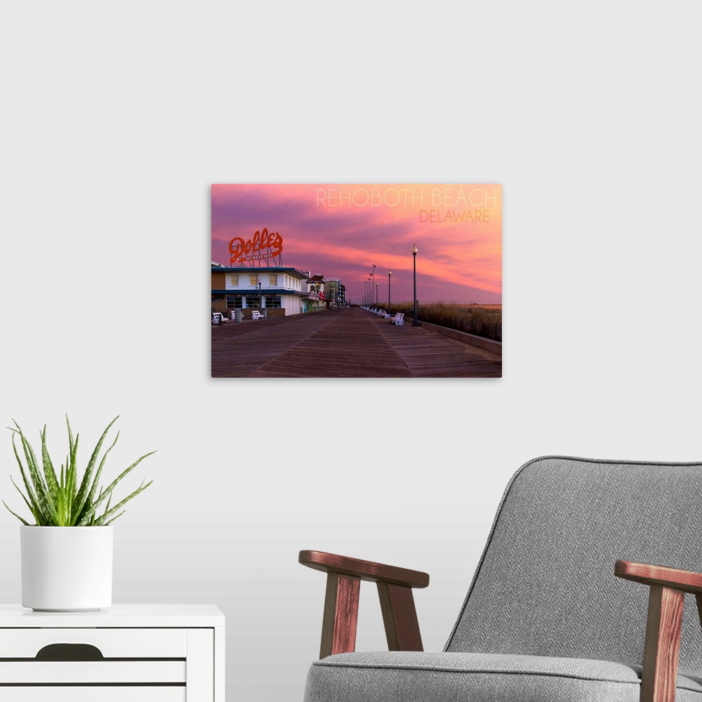 A modern room featuring Photograph of Rehoboth Beach, Delaware of the Dolles candy store and vibrant sunset.