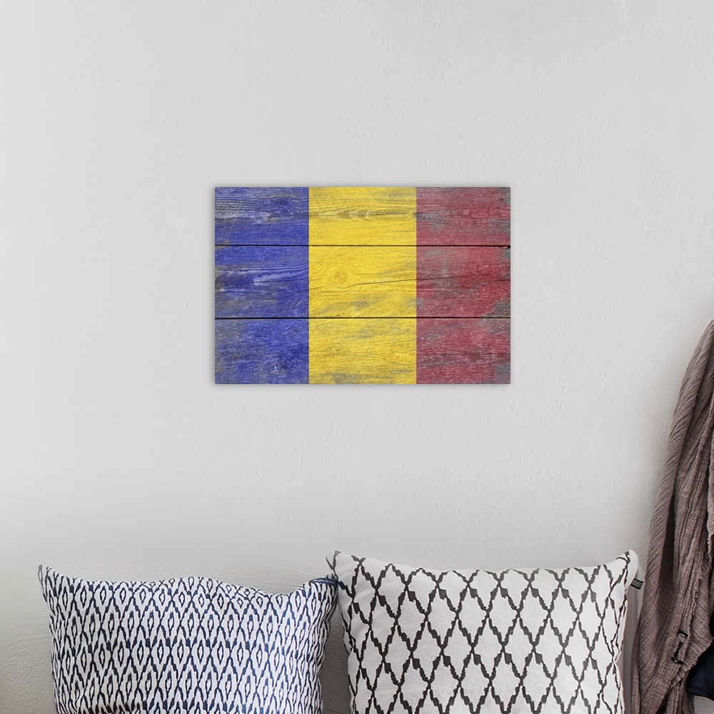 A bohemian room featuring The flag of Romania with a weathered wooden board effect.