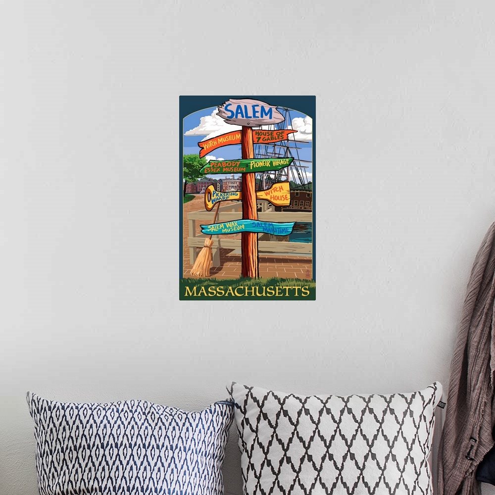 A bohemian room featuring Retro stylized art poster of a sign post showing signs for multiple directions.