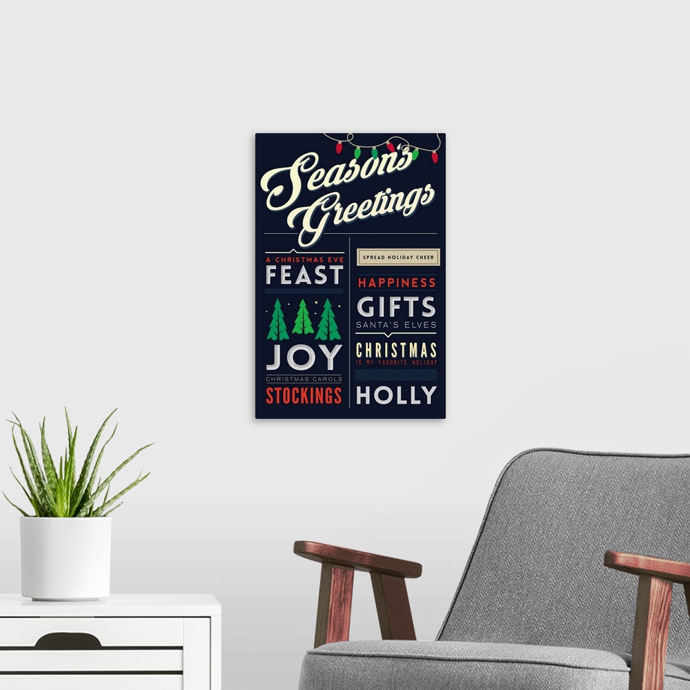 A modern room featuring Christmas typography artwork.