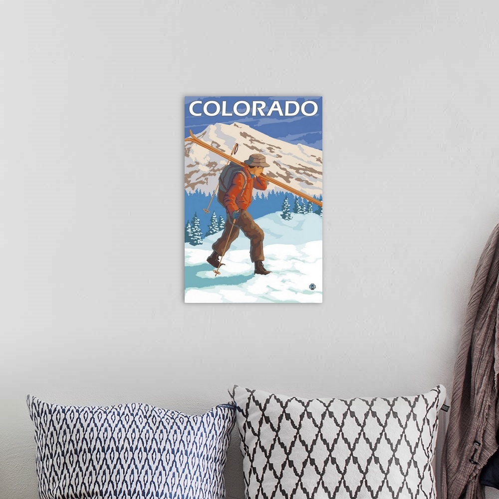 A bohemian room featuring Skier Carrying Skis - Colorado: Retro Travel Poster