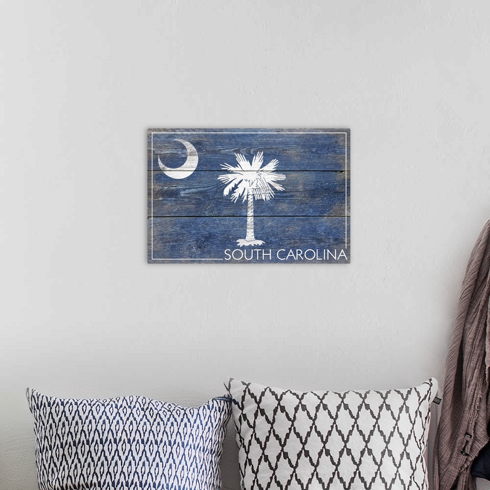 A bohemian room featuring The flag of South Carolina with a weathered wooden board effect.