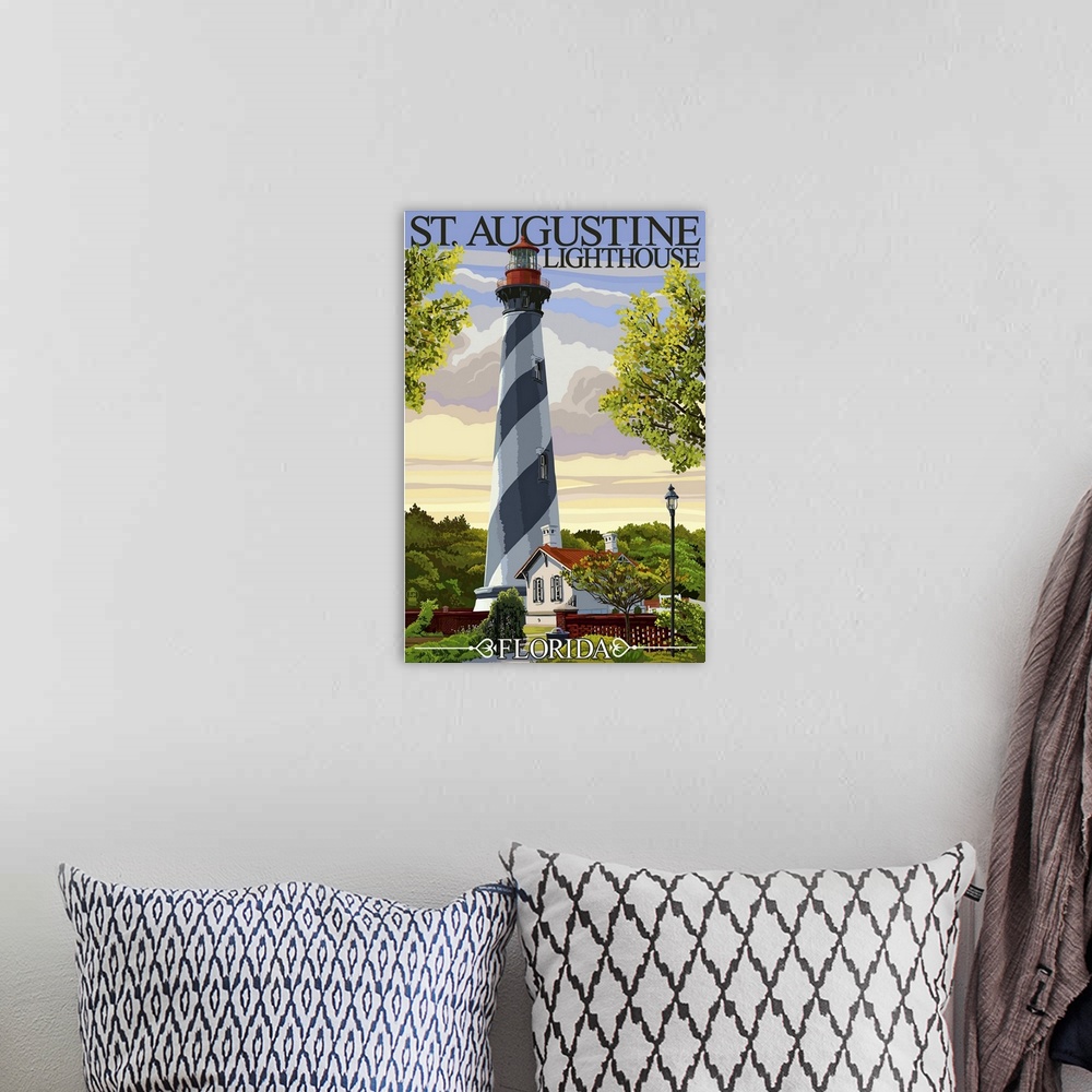 A bohemian room featuring Retro stylized art poster of a striped lighthouse.