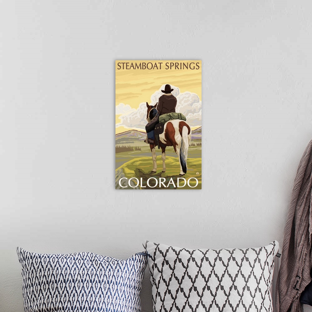 A bohemian room featuring Steamboat Springs, Colorado - Cowboy on Horseback: Retro Travel Poster