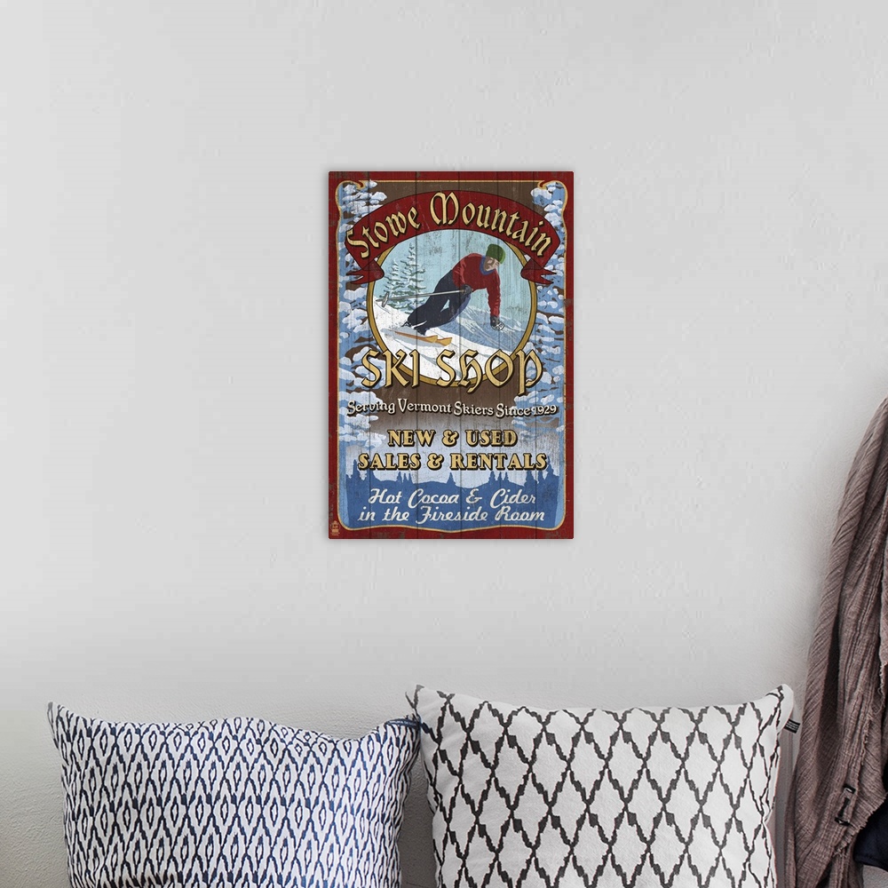A bohemian room featuring Retro stylized art poster of a vintage ski shop sign, with a skier going down a hill.