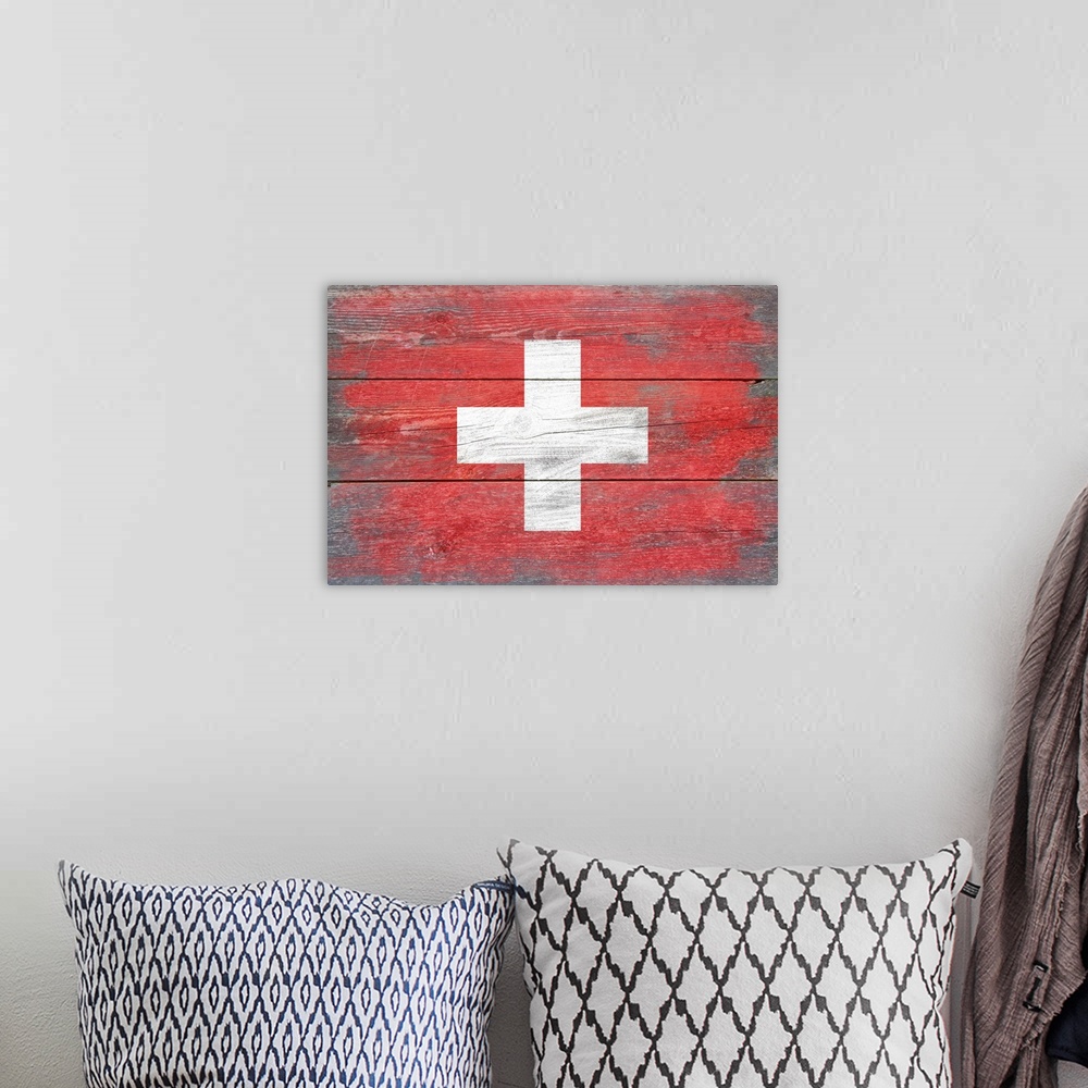 A bohemian room featuring The flag of Switzerland with a weathered wooden board effect.