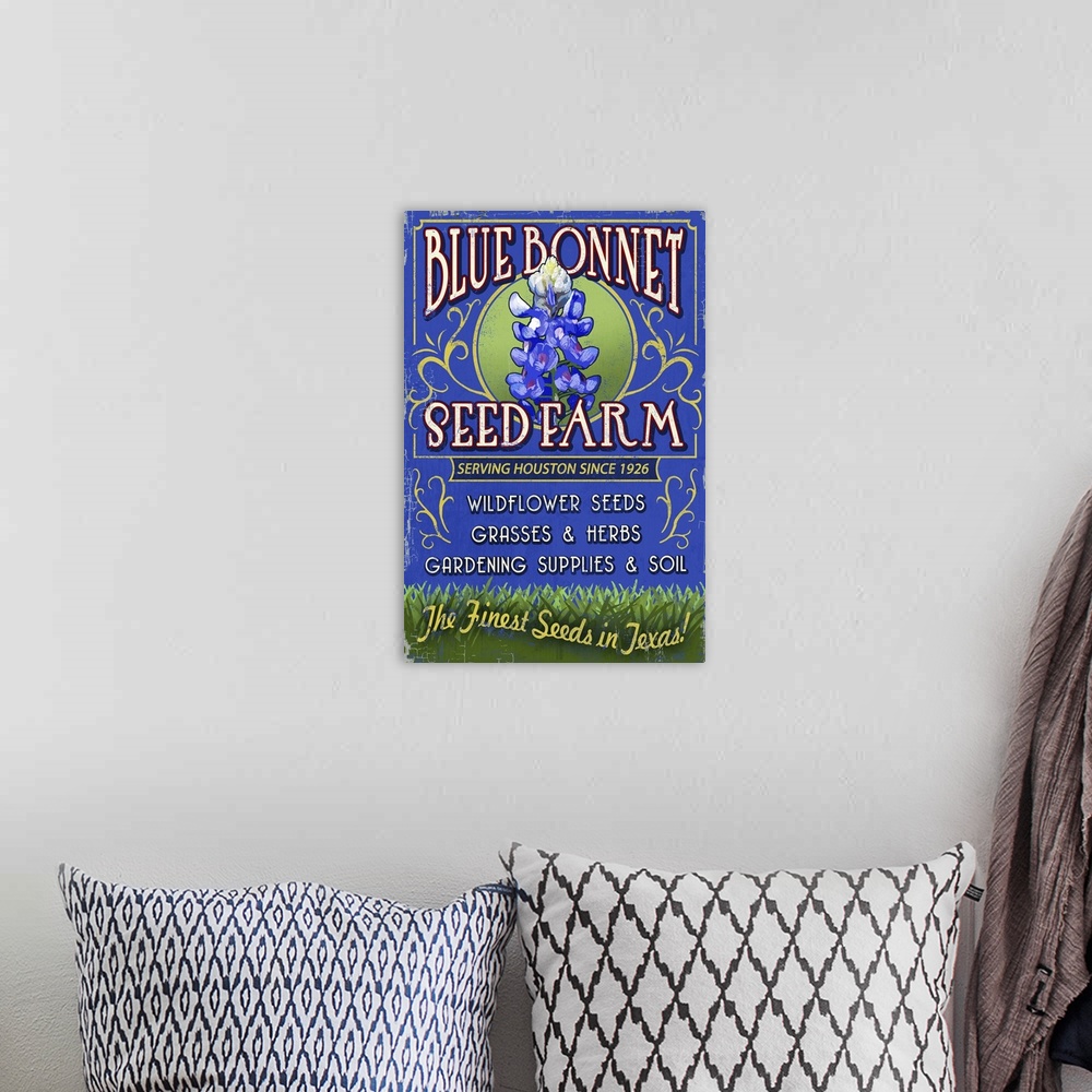 A bohemian room featuring Retro stylized art poster of a vintage sign advertising a seed farm, with a blue bonnet flower in...