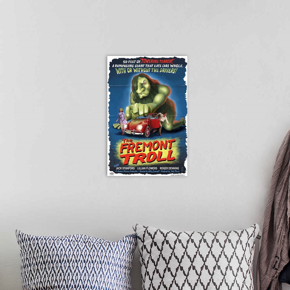 A bohemian room featuring Retro stylized art poster of vintage movie poster of a troll grabbing a car, and its passengers r...