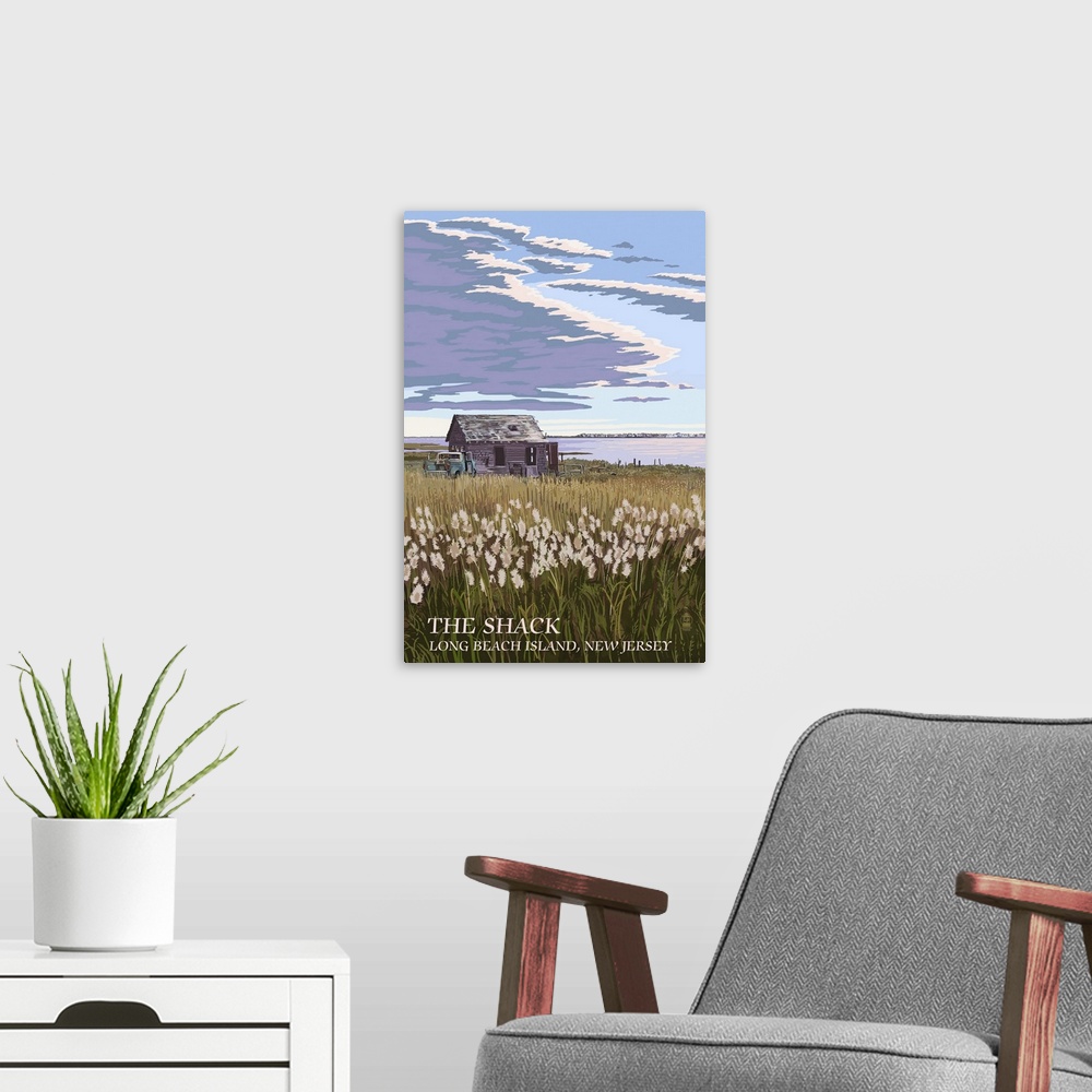 A modern room featuring Retro stylized art poster of a field of tall grass with an old shack, under a cloudy sky.