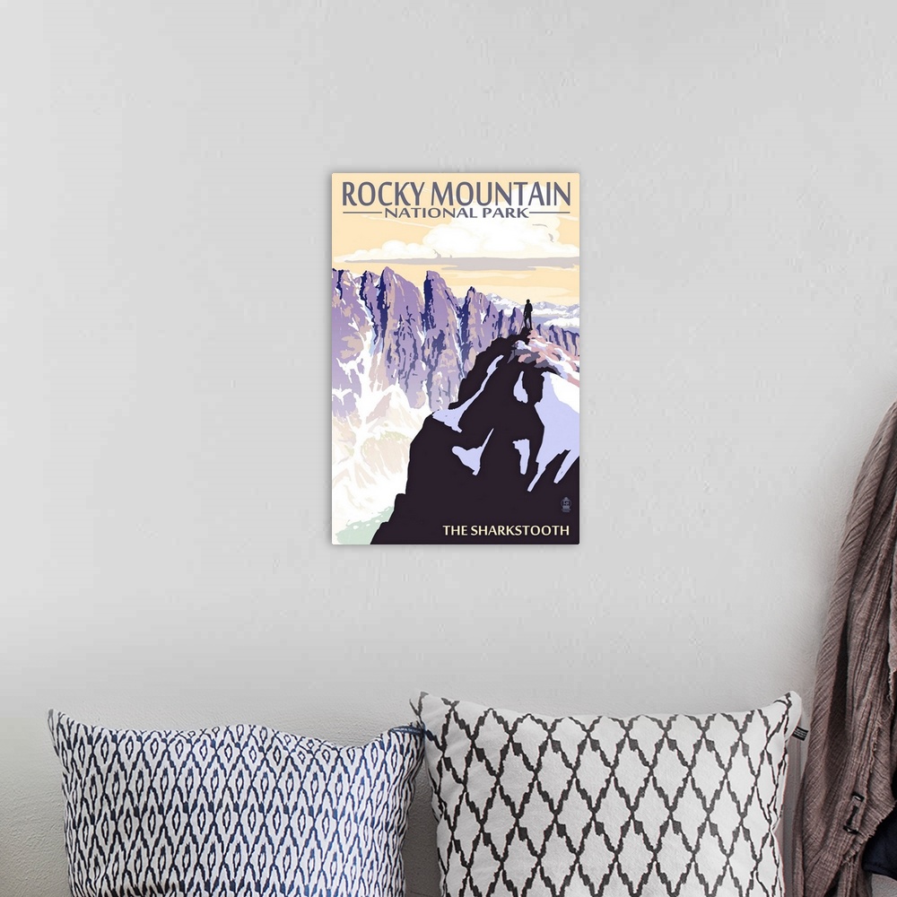 A bohemian room featuring Retro stylized art poster of jagged mountain cliffs in winter.