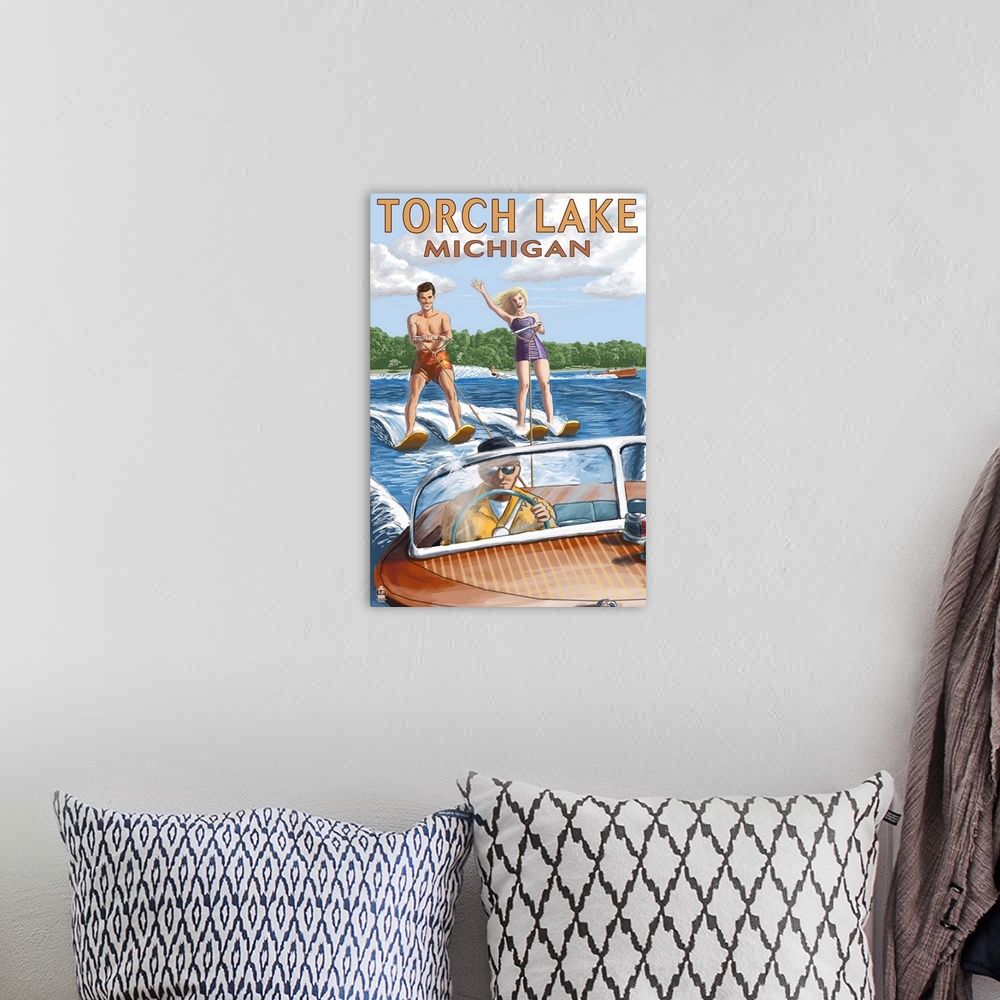 A bohemian room featuring Torch Lake, Michigan - Water Skiing and Wooden Boat : Retro Travel Poster