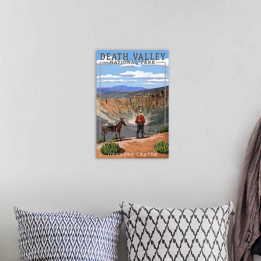A bohemian room featuring Retro stylized art poster of a man and a donkey overlooking a desert valley.