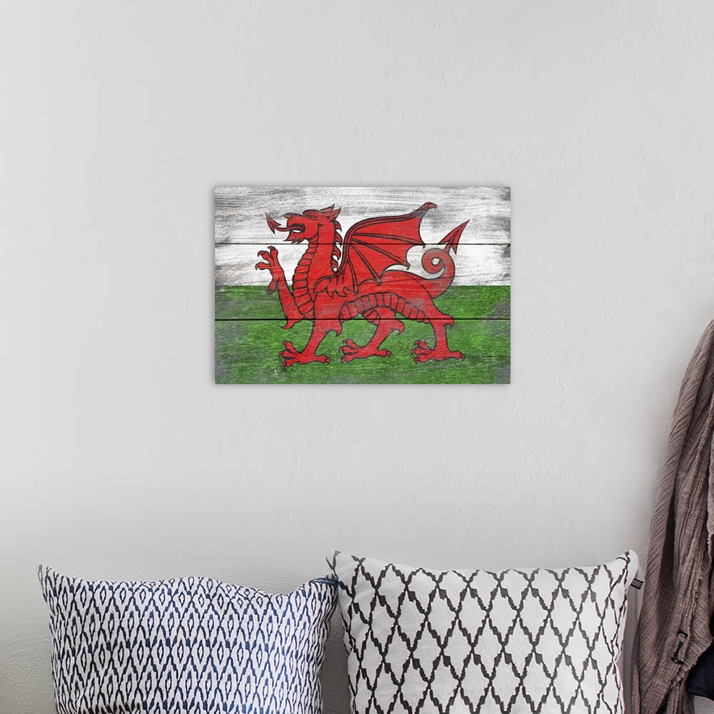 A bohemian room featuring The flag of Wales with a weathered wooden board effect.