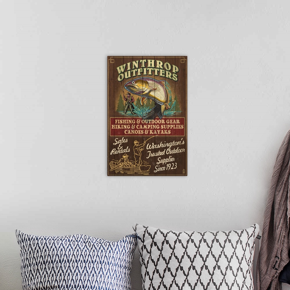 A bohemian room featuring Retro stylized art poster of a vintage of fisherman catching a fish.