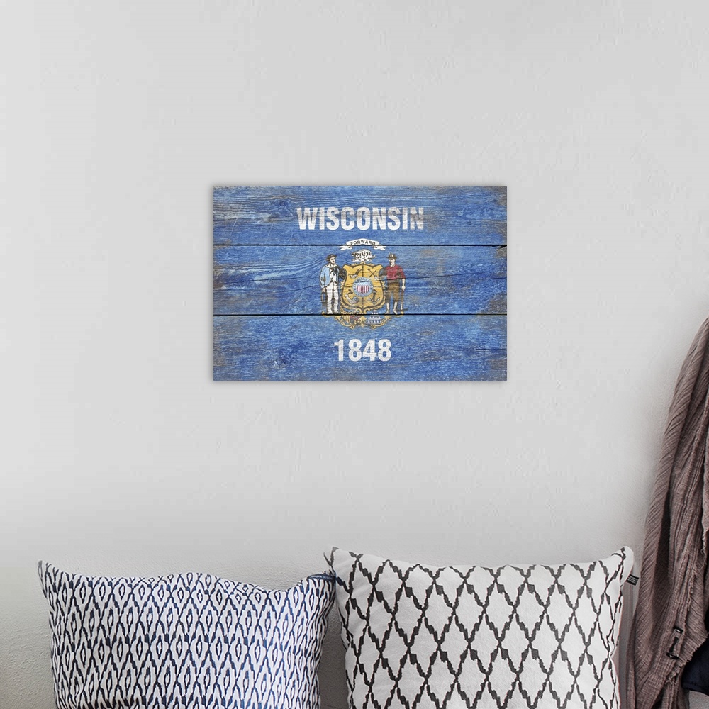 A bohemian room featuring The flag of Wisconsin with a weathered wooden board effect.