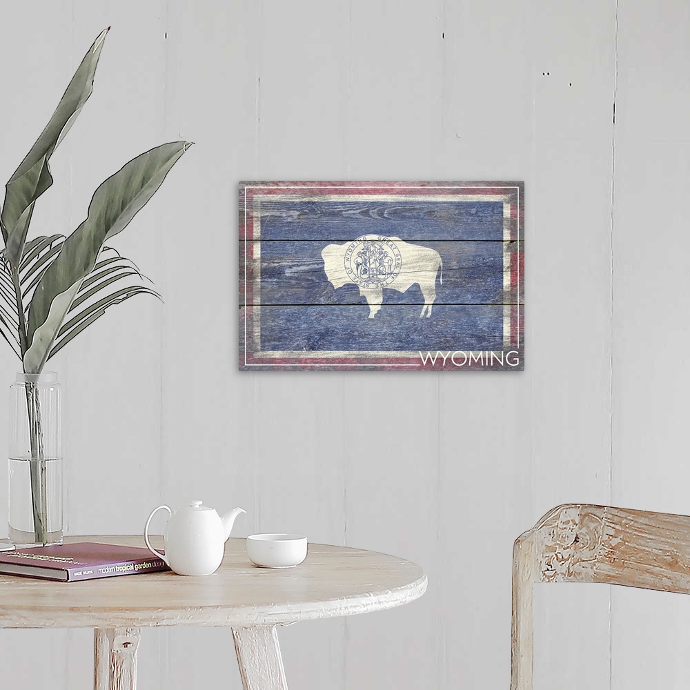 A farmhouse room featuring The flag of Wyoming with a weathered wooden board effect.