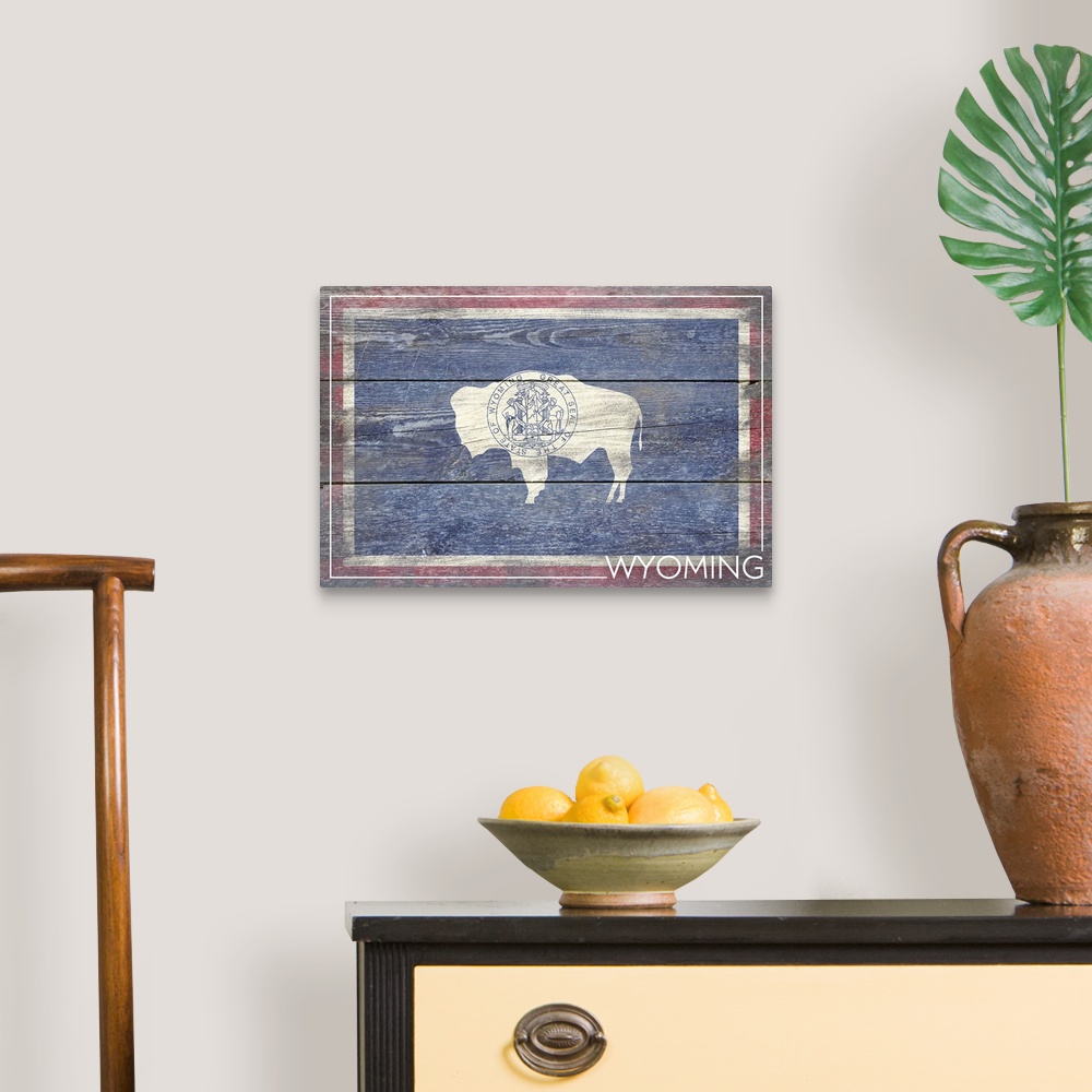 A traditional room featuring The flag of Wyoming with a weathered wooden board effect.