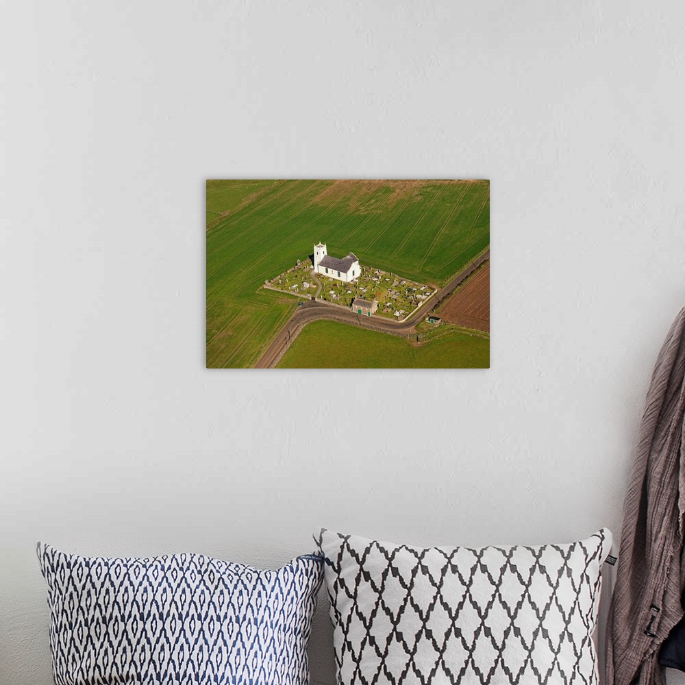A bohemian room featuring Ballintoy Parish Church, Bushmills, Northern Ireland - Aerial Photograph