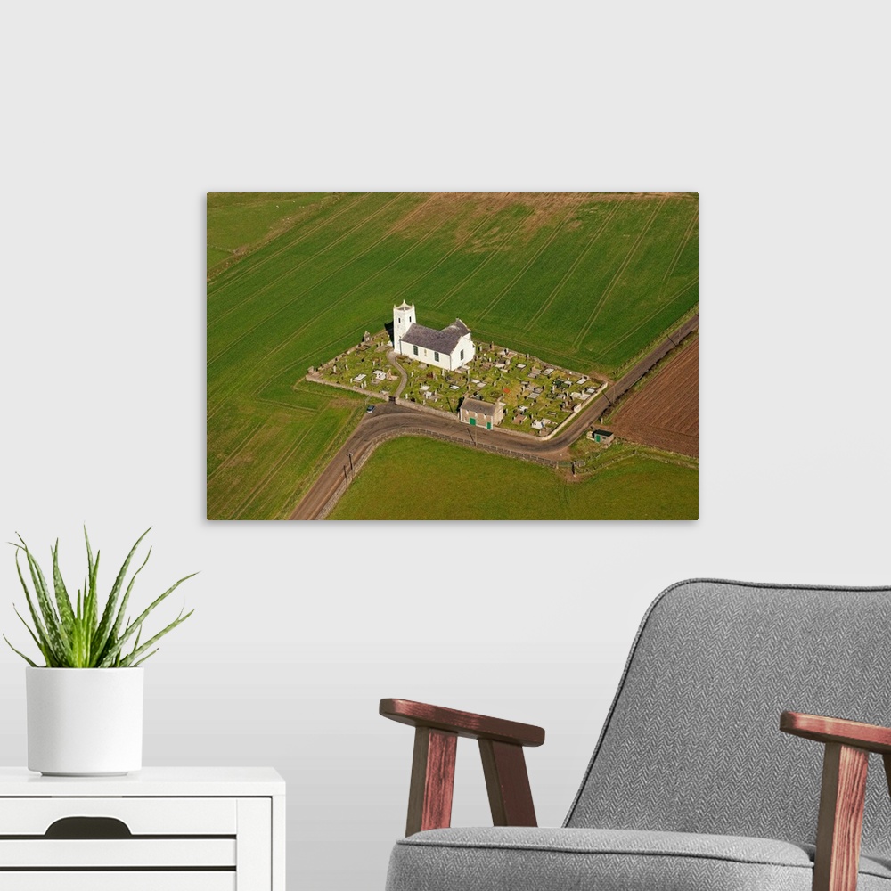A modern room featuring Ballintoy Parish Church, Bushmills, Northern Ireland - Aerial Photograph