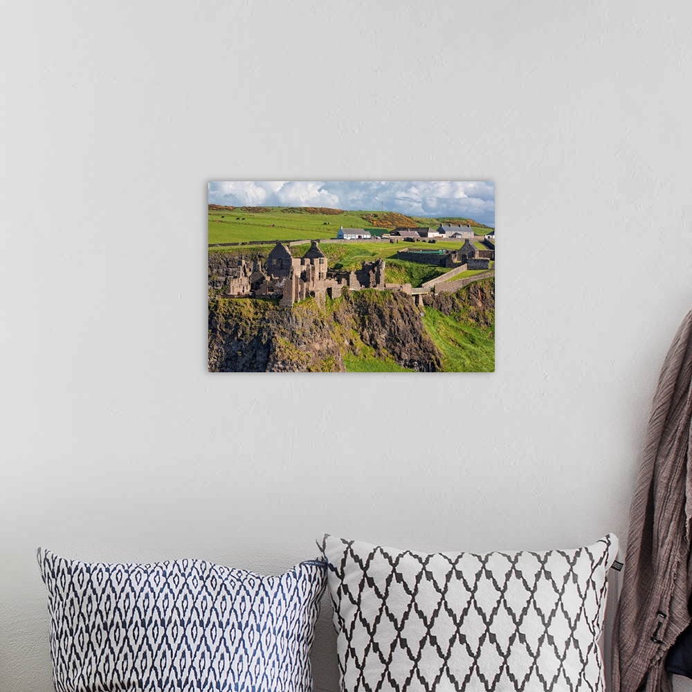 A bohemian room featuring Dunluce Castle, Bushmills, Northern Ireland - Aerial Photograph
